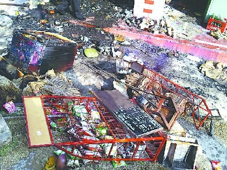 Short circuit, two shops and burned tents House
